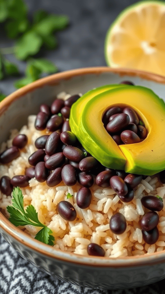 Bowl of cilantro lime rice topped with black beans and sliced avocado