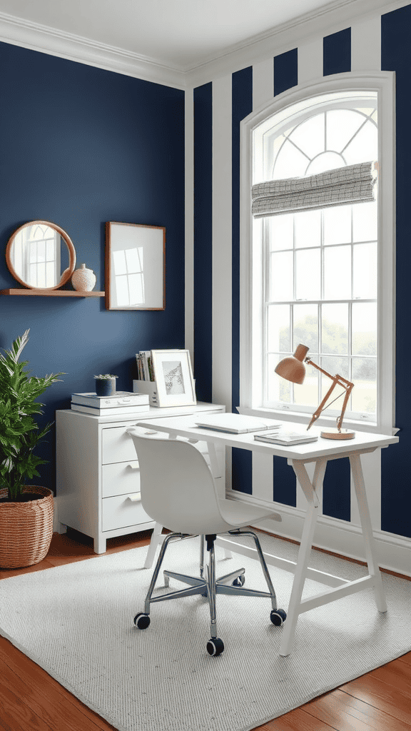 A stylish home office featuring navy striped wallpaper and a white desk setup