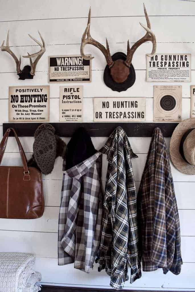 Rustic entryway with antlers and peg rack for coats