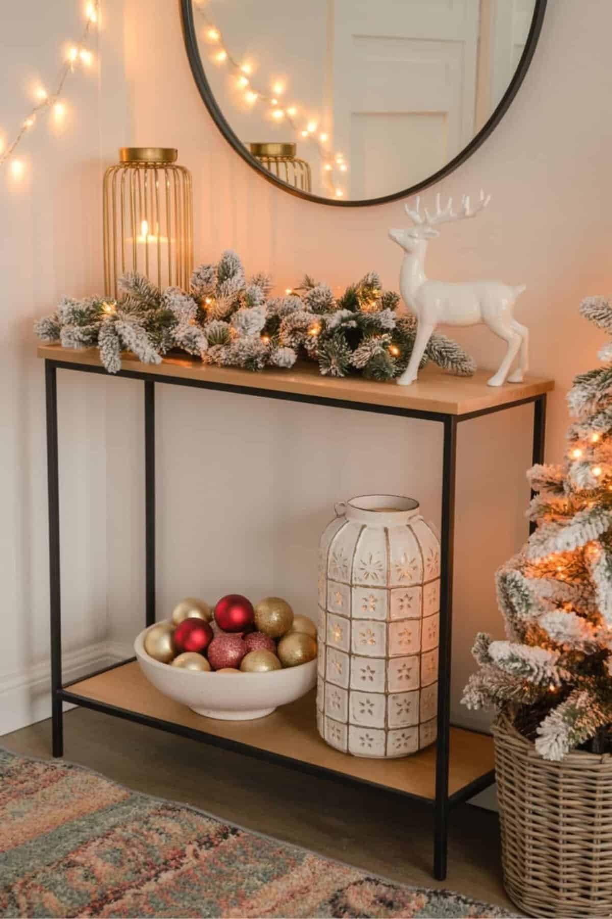 Holiday ready Christmas entryway table with flocked garland