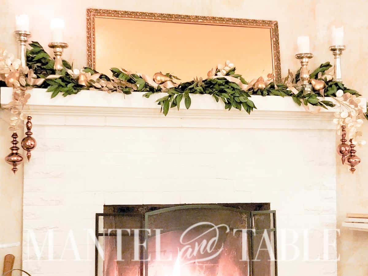 Gold and mixed metals winter fireplace mantel decor
