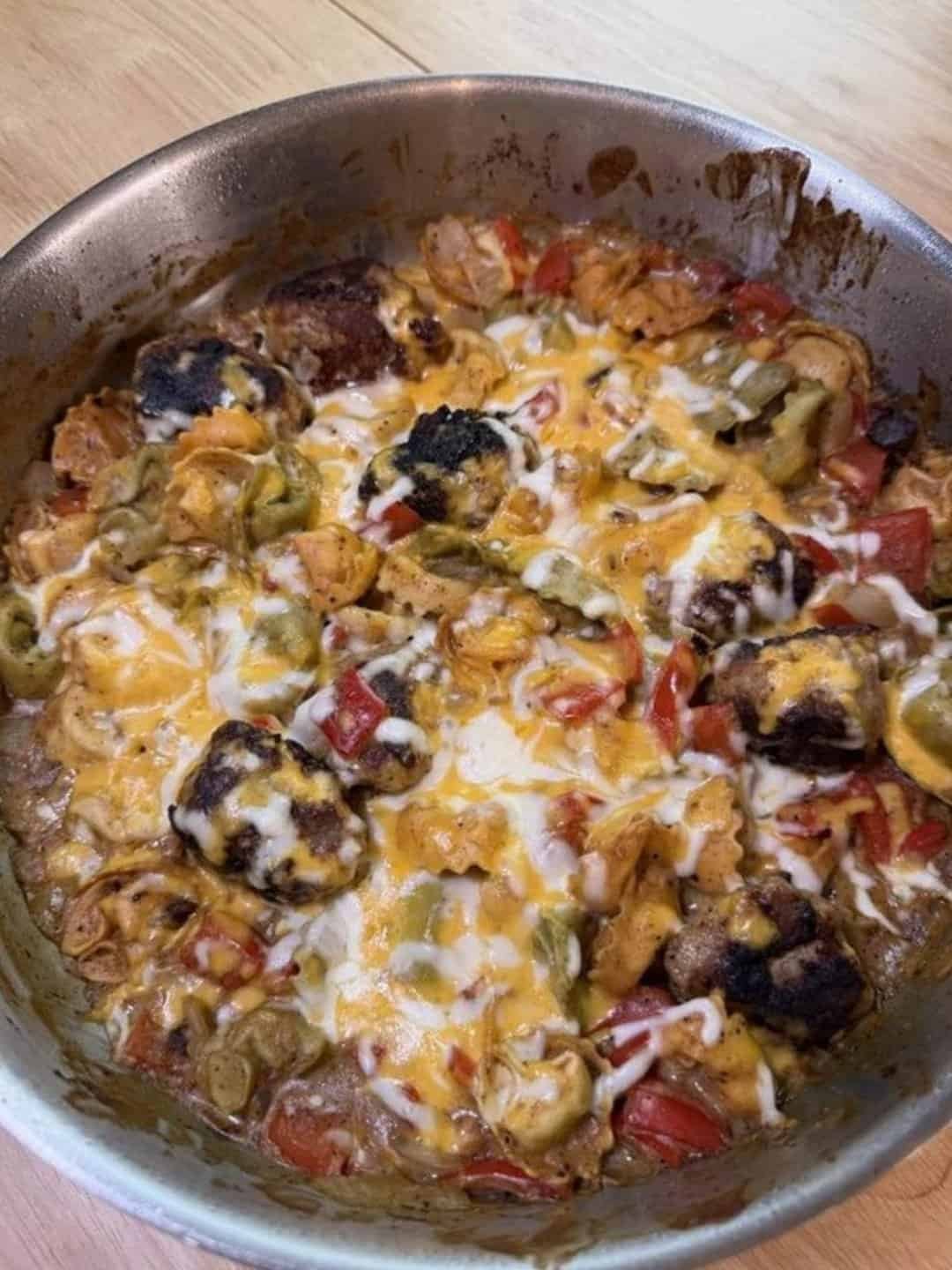 Cheesy meatball tortellini skillet with peppers and melted cheese
