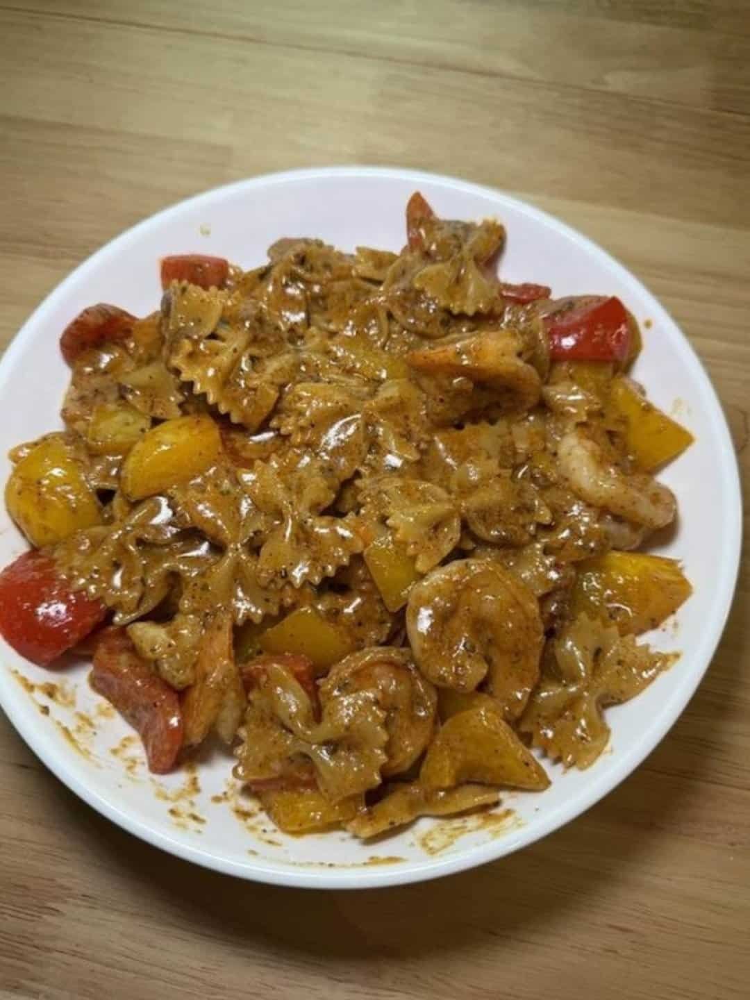 Creamy cajun shrimp bowtie pasta with bell peppers