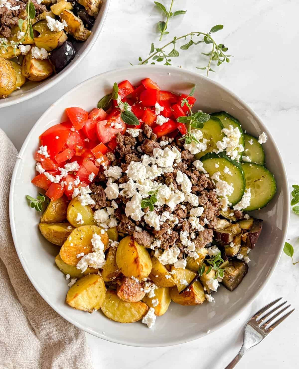 Greek bowl with ground beef, potatoes and feta