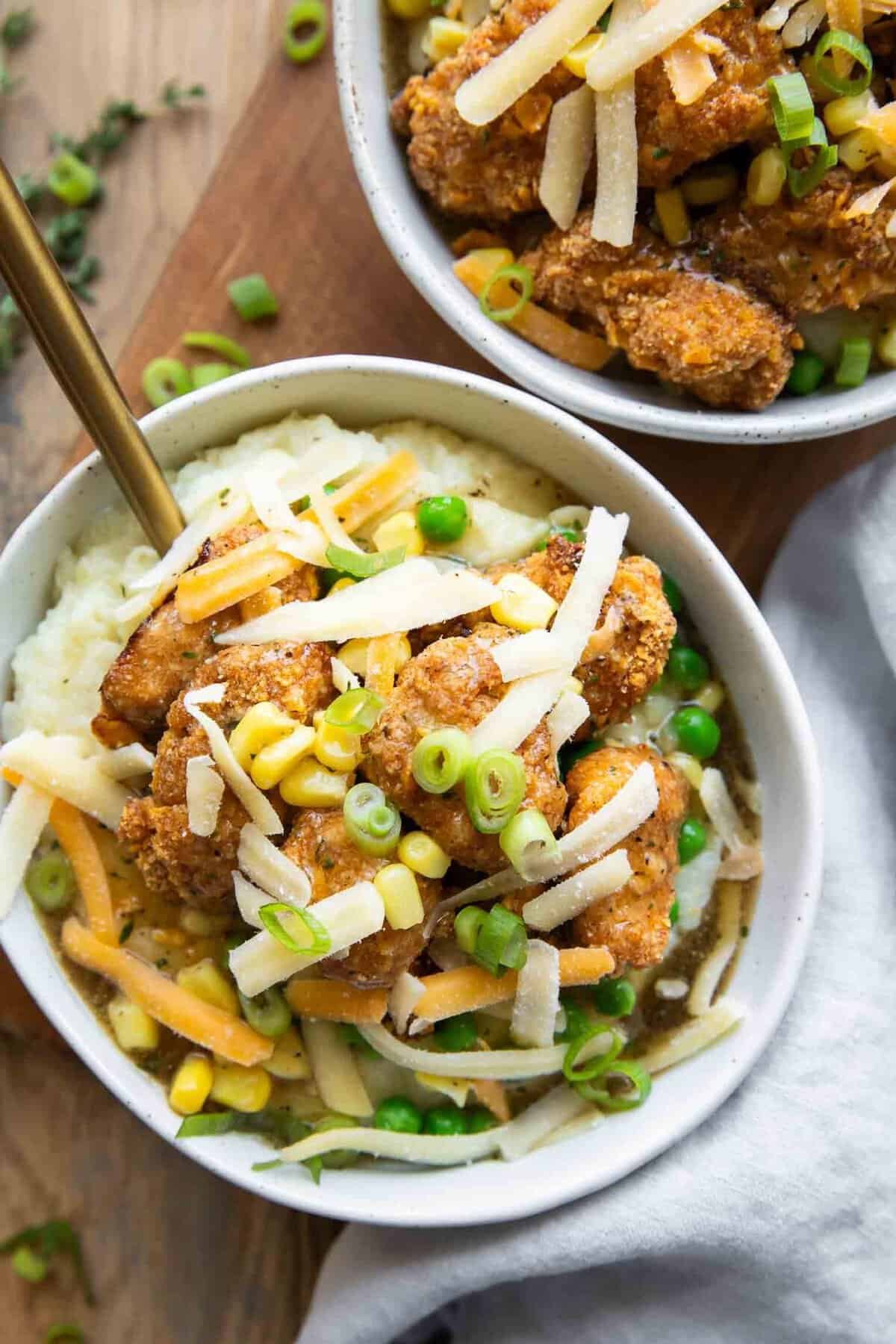 High protein copycat KFC mashed potato bowl with crispy chicken and gravy
