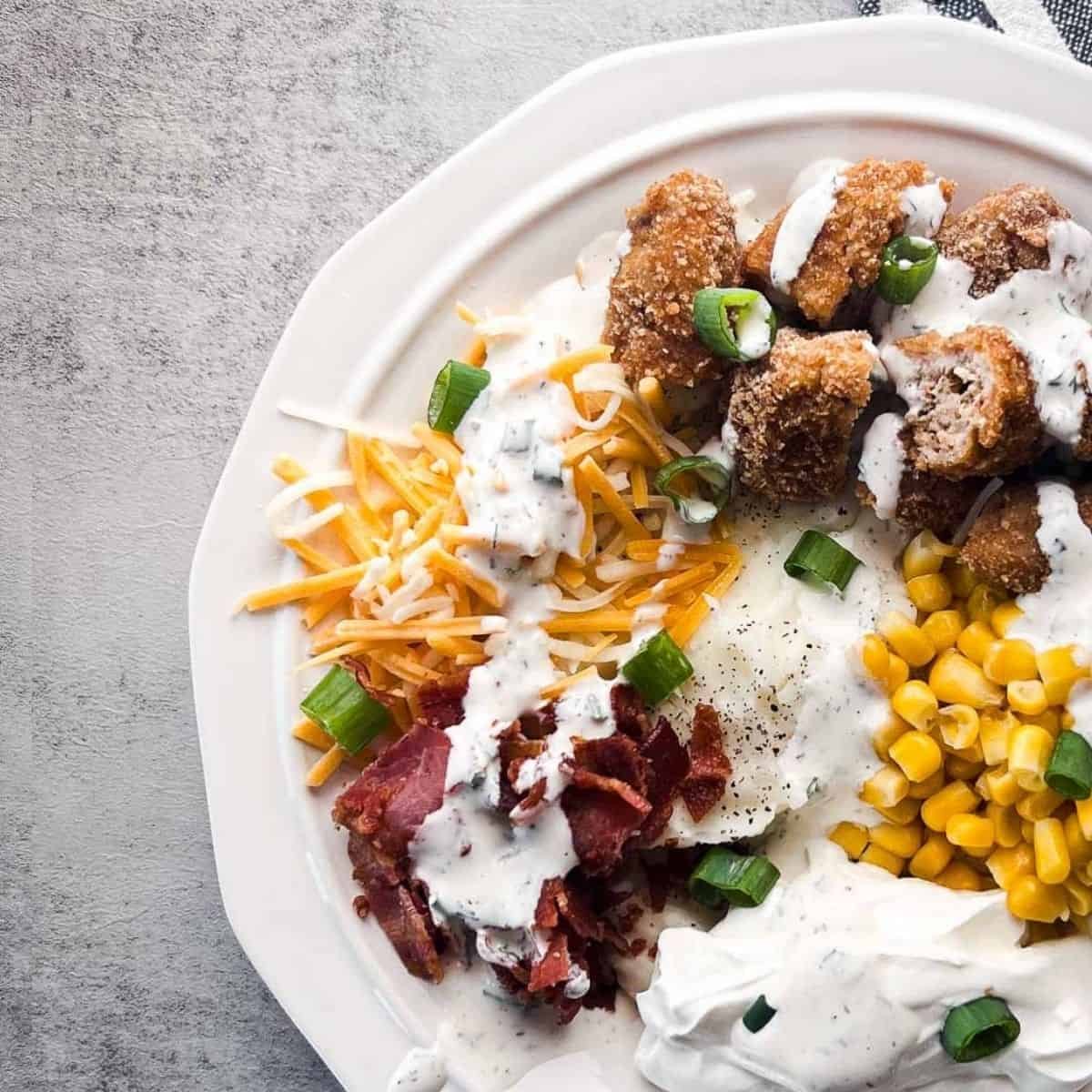 Loaded mashed potato bowls with chicken, bacon, cheese and corn