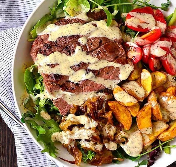 Steak and potato bowls with caramelized onions