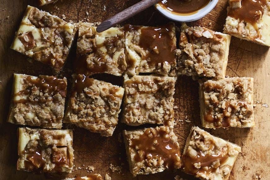 Caramel apple cheesecake bars with streusel topping