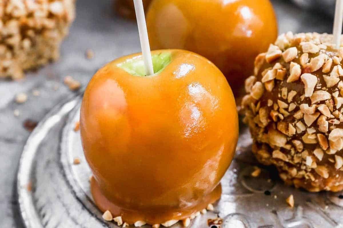 Homemade caramel apples on sticks
