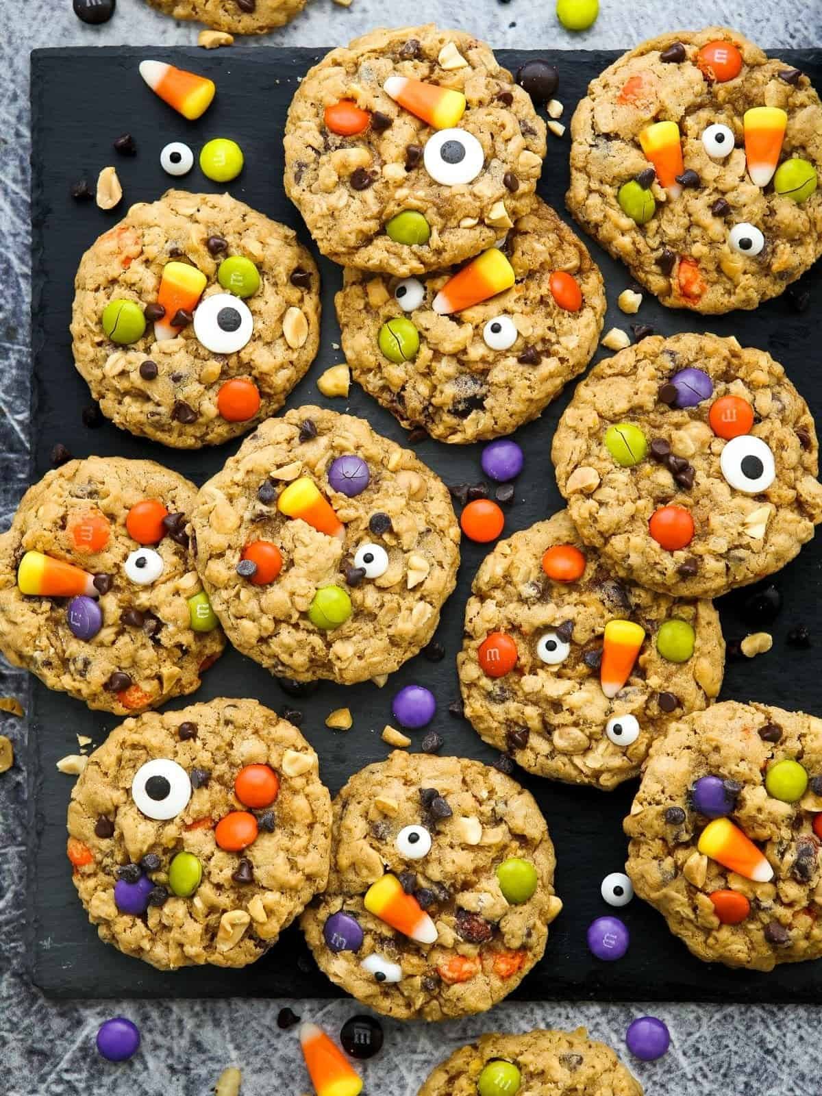 Halloween monster cookies with M&Ms, candy corn and candy eyes