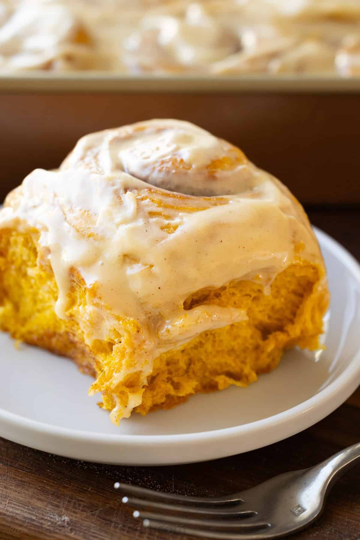 Pumpkin cinnamon rolls with maple cream cheese frosting