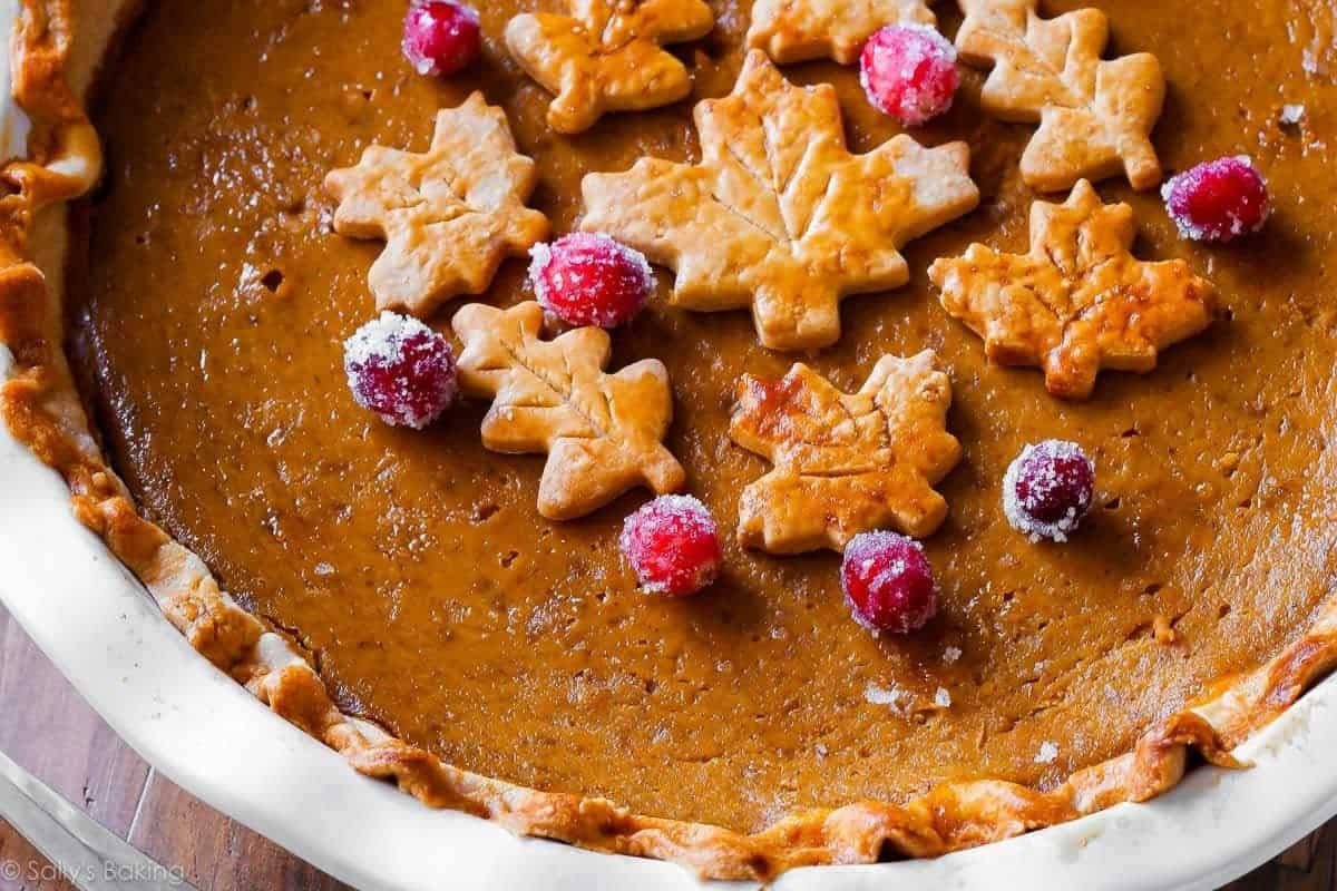 Classic pumpkin pie decorated with pie crust leaves