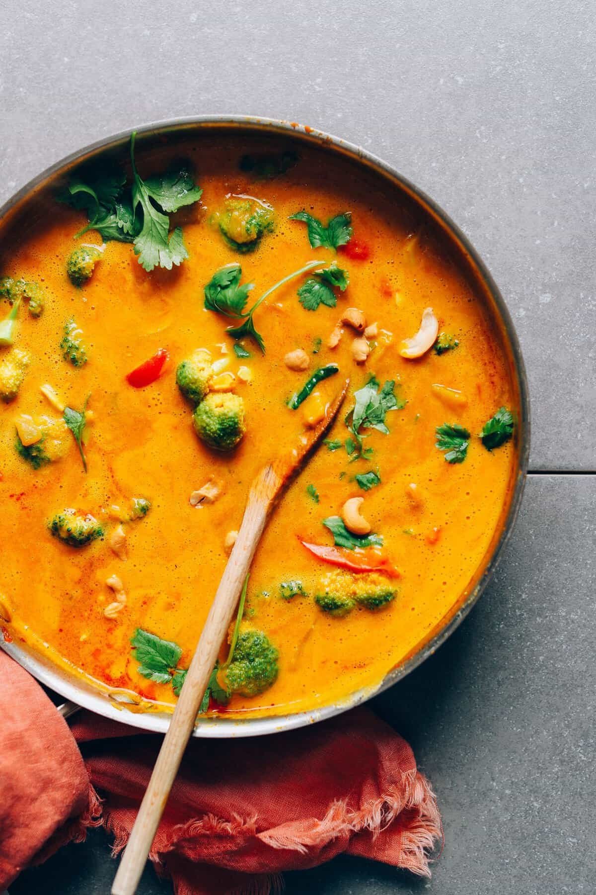 Pumpkin yellow curry with broccoli and cashews
