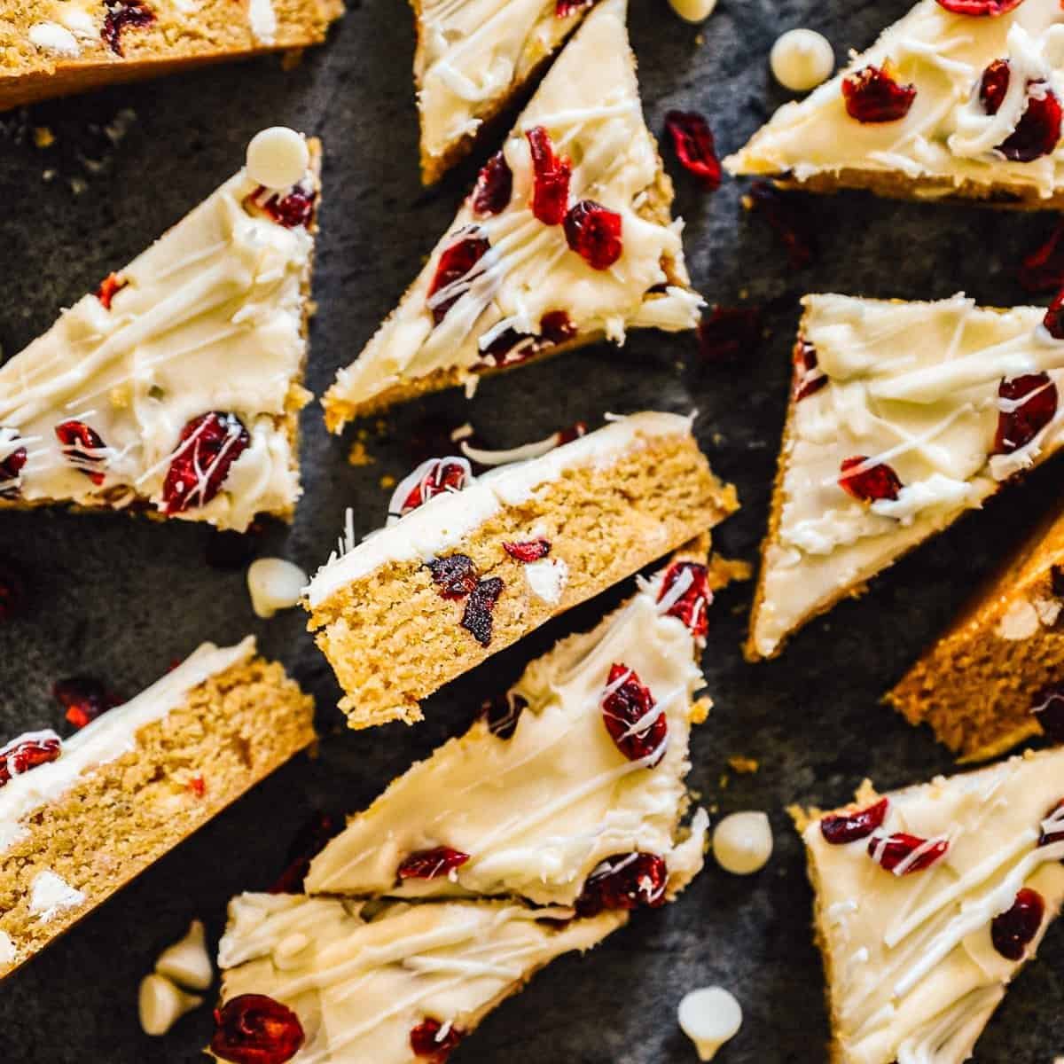 Cranberry bliss bars with cream cheese frosting and white chocolate