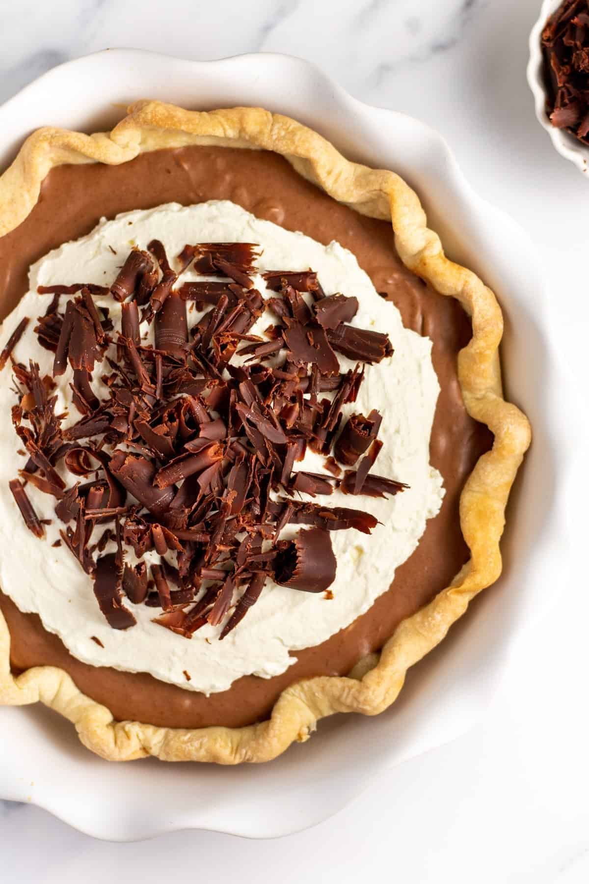 Slice of French silk chocolate pie with whipped cream