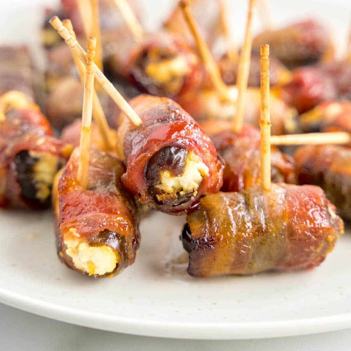 Bacon wrapped dates stuffed with goat cheese and drizzled with honey