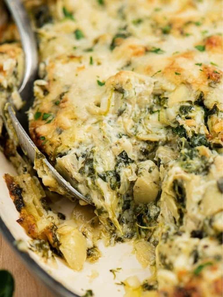 Hot baked spinach artichoke dip with melted cheese