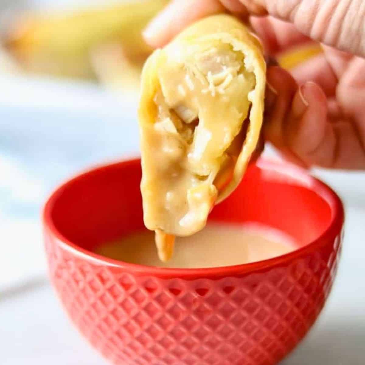 Baked Thanksgiving egg rolls filled with turkey, stuffing and mashed potatoes