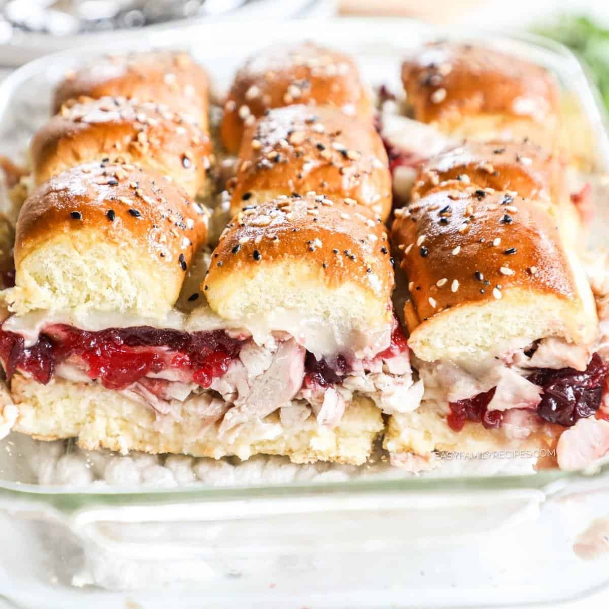 Turkey cranberry sliders on glazed Hawaiian rolls with melted provolone