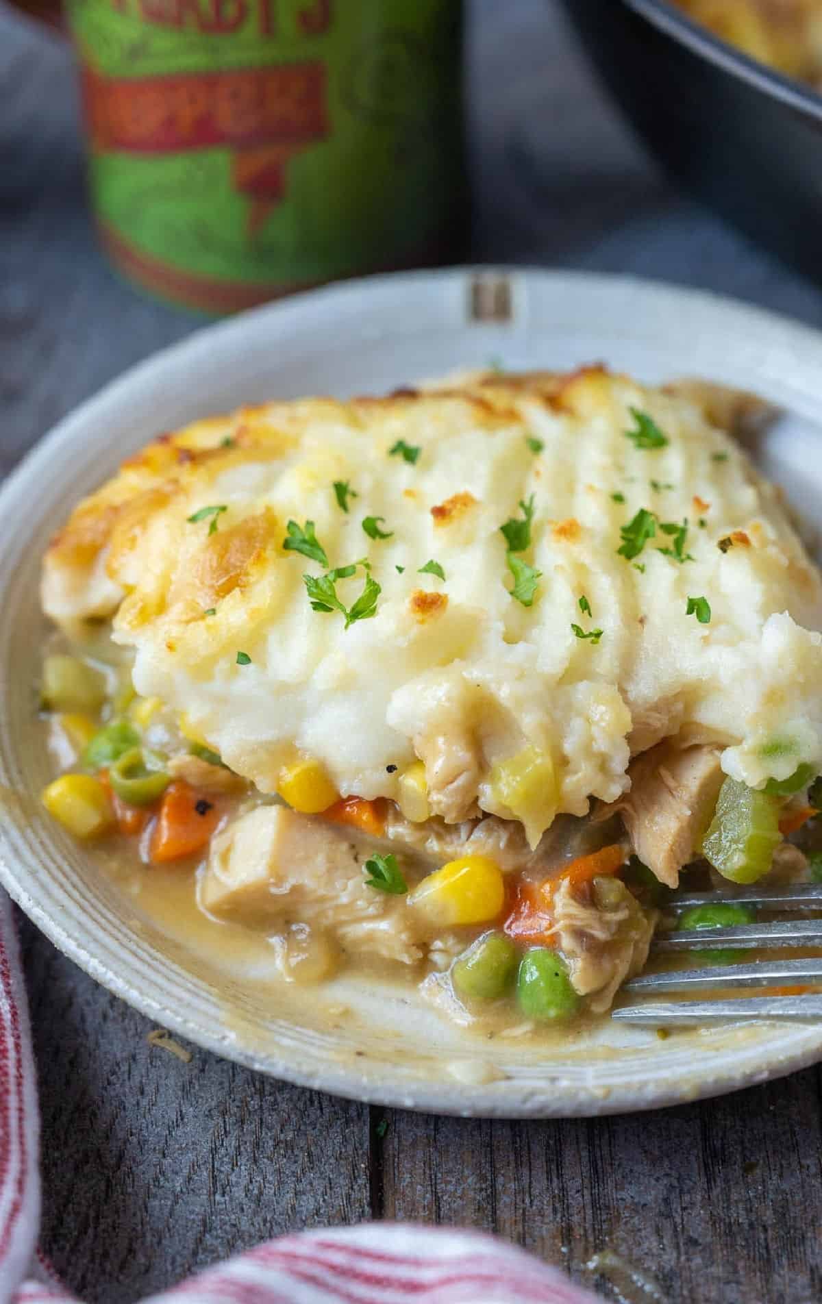 Turkey shepherd's pie with a browned mashed potato topping in a skillet